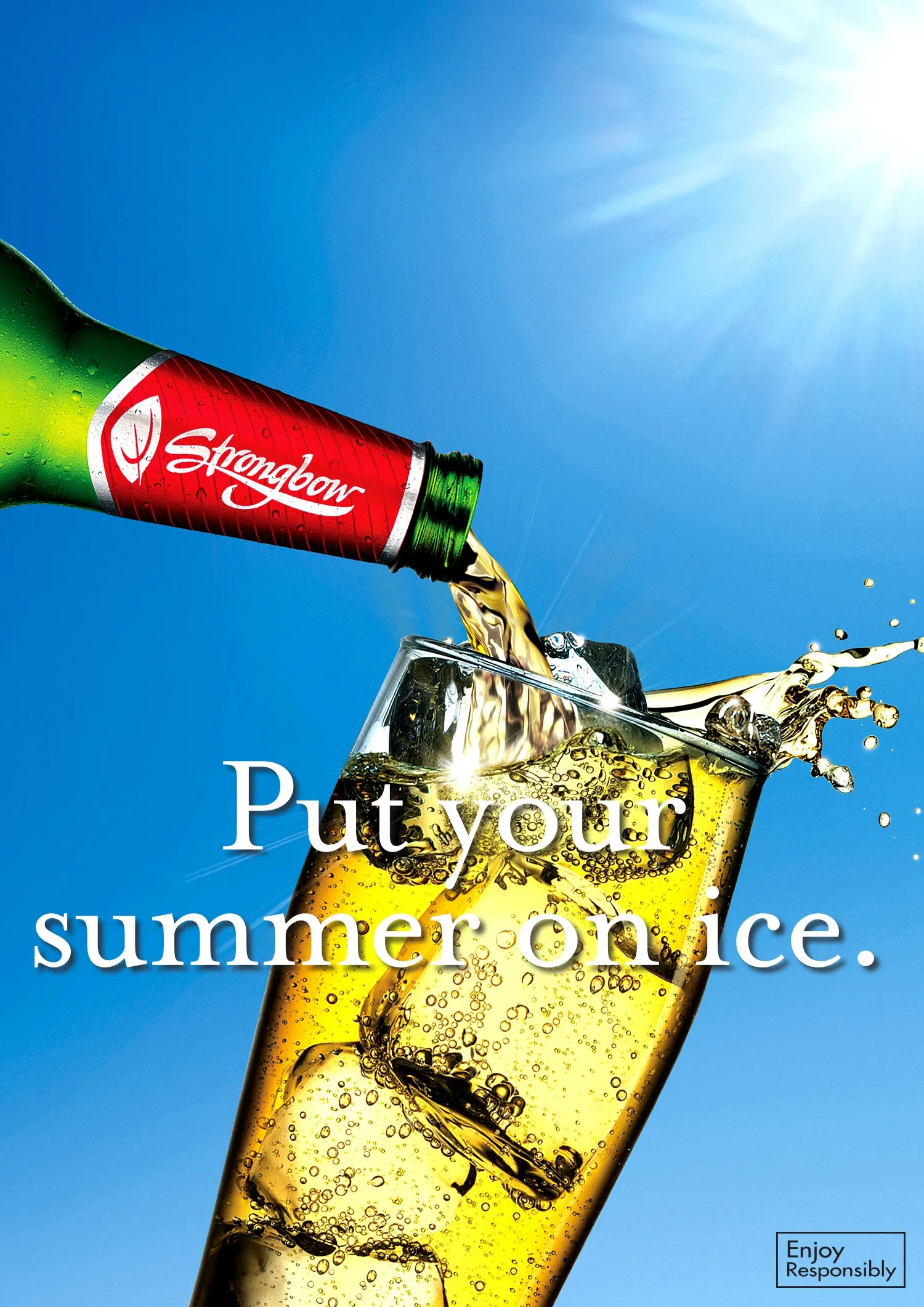 An outdoor poster for Strongbow that says "Put your summer on ice" and shows cider being poured into a glass in summer